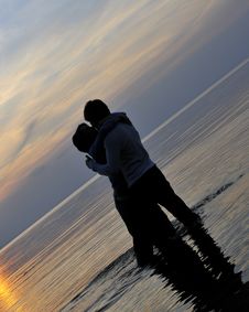 Romantic Couple At Sunset Royalty Free Stock Photography Romantic Couple At Sunset Royalty Free Stock Photography