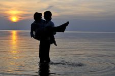 Romantic Couple At Sunset Stock Image Romantic Couple At Sunset Stock Image