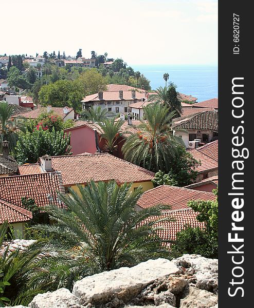 View on roofs of the old town of Antalya with seaside.