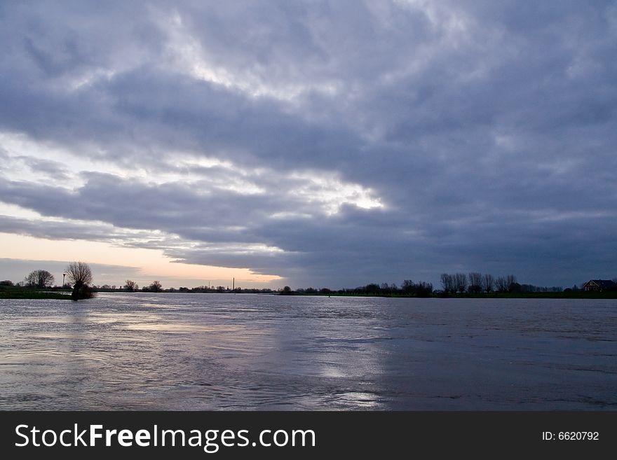 River Lek with a clouded sky