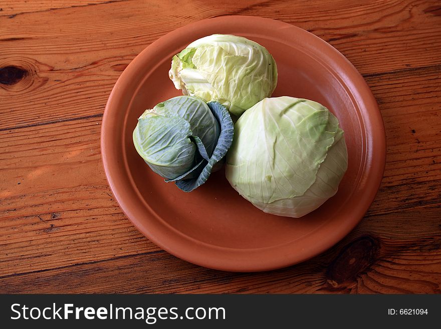 Cabbage on a brown plate