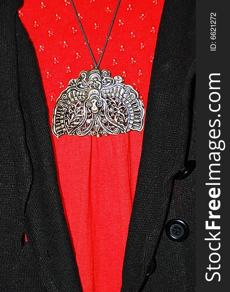 Handicraft  Necklack on the fashion clothes. Handicraft  Necklack on the fashion clothes
