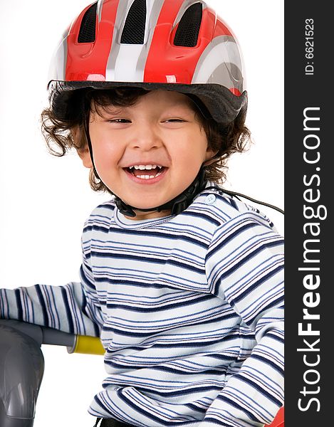 The child in a protective helmet. The child in a protective helmet