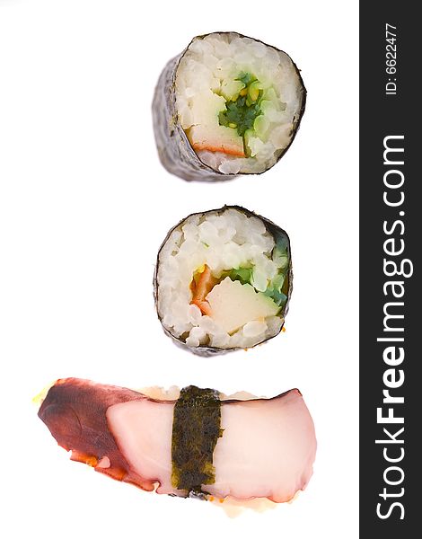 Close up view of fresh sushi rolls  isolated on white back