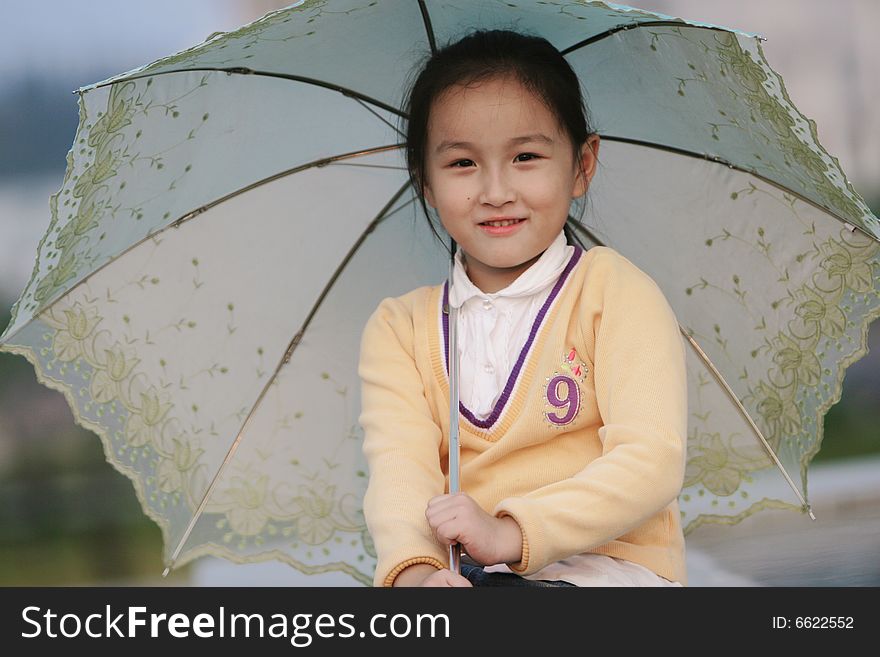 Smiling Girl With A Umbrella