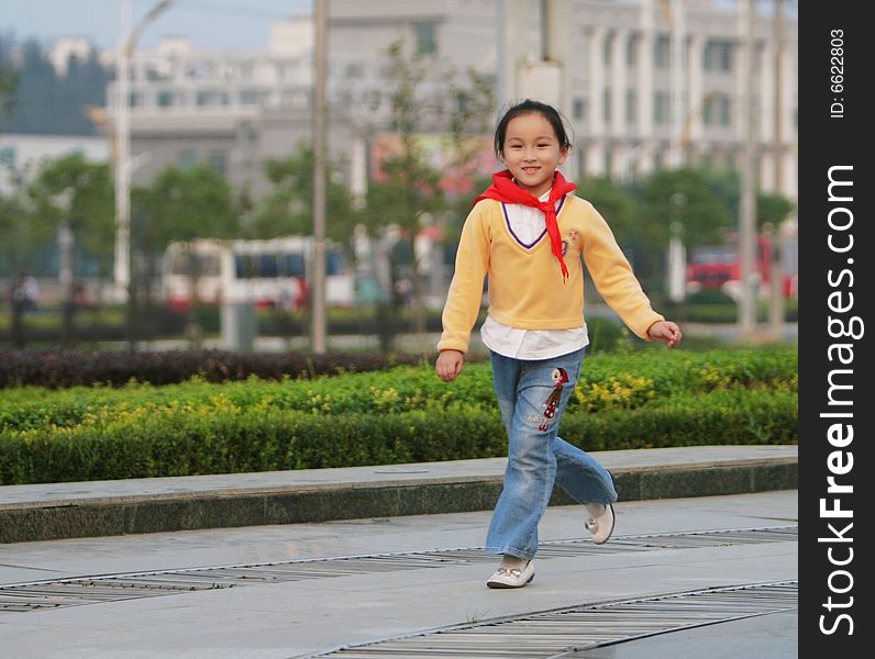 The walking girl in a park . The walking girl in a park .