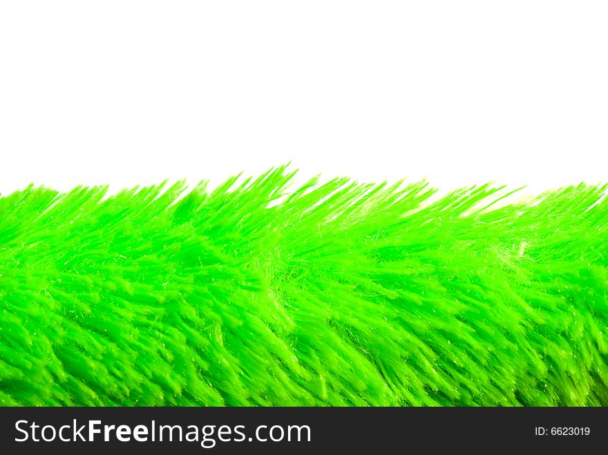 Artificial soft grass on a white background