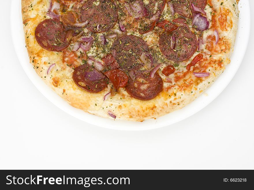 Pizza on a plate on white background