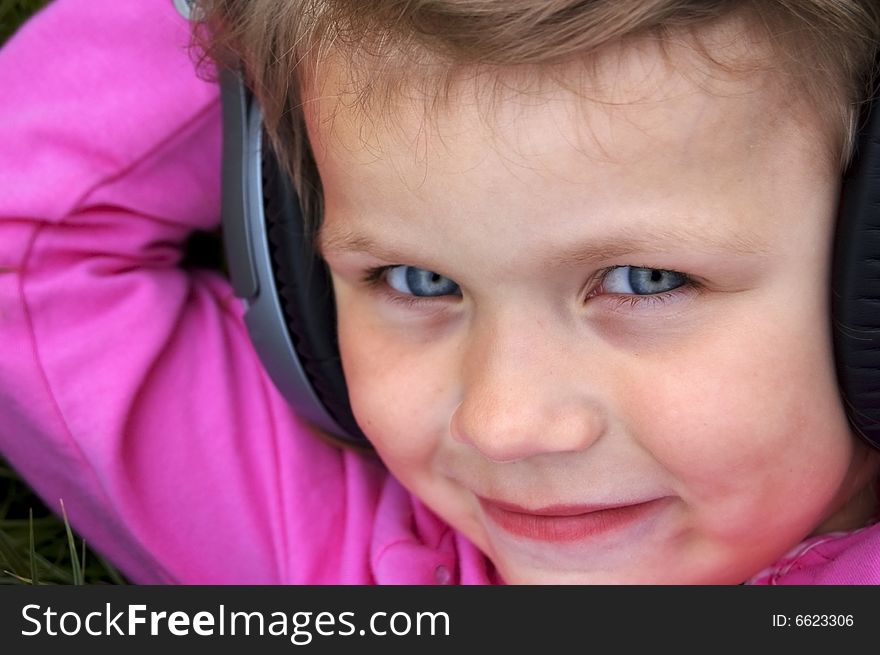 Young girl listening to music