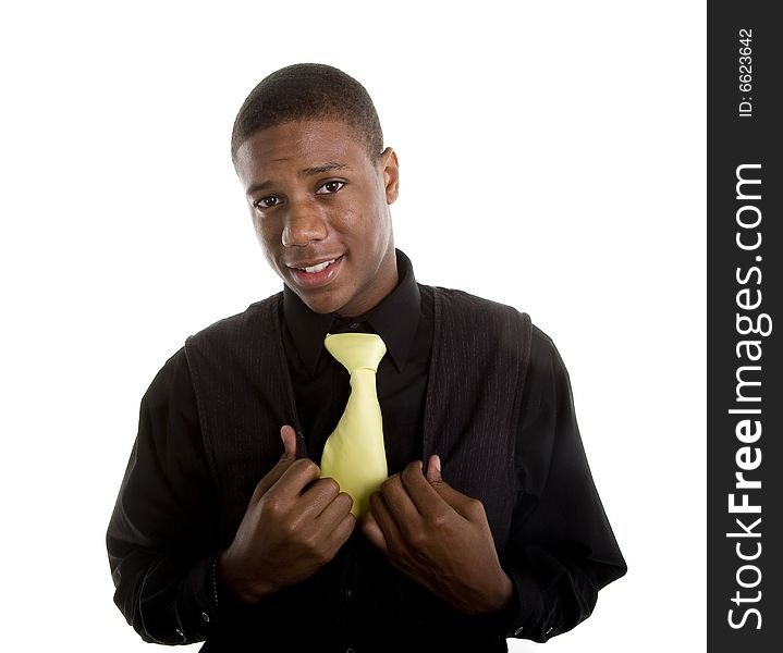 Young Black Man In Yellow Tie Hands On Vest