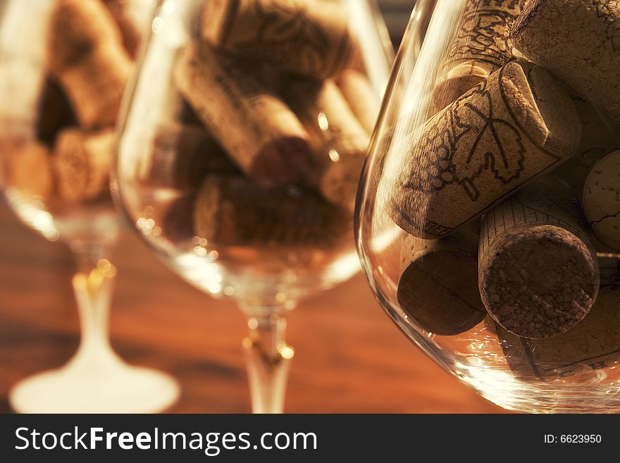 Three bowls of wine bottle corks on the table