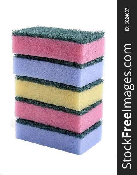 A stack of colourful cleaning sponges.