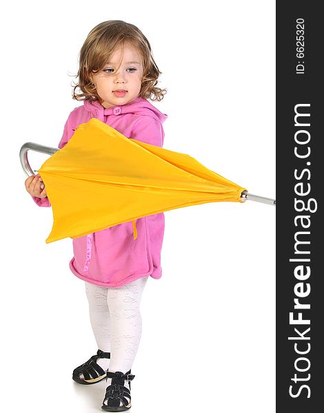 Beauty a little girl with yellow umbrella