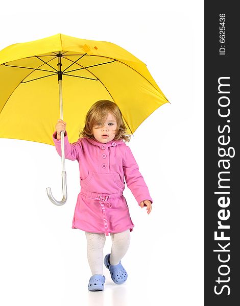 Beauty a little girl with yellow umbrella
