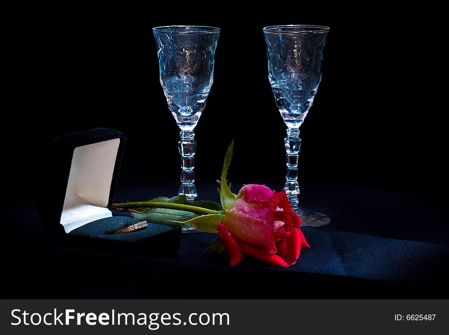 Rose, engagement ring and flutes. Rose, engagement ring and flutes