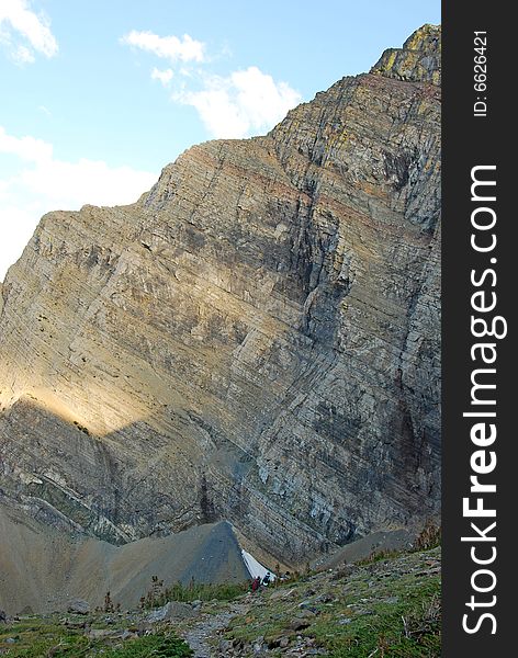 A red color mountain peak on Carthew-Alderson Trail in Waterton National Park Alberta Canada. A red color mountain peak on Carthew-Alderson Trail in Waterton National Park Alberta Canada