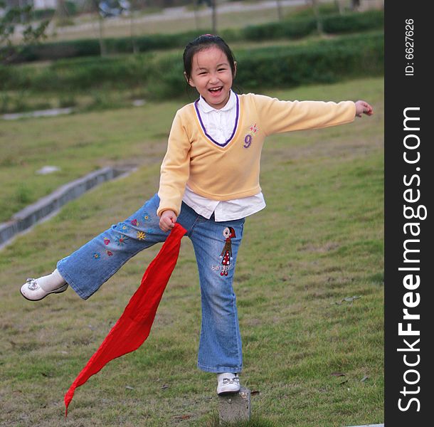 The asian  girl in a park . The asian  girl in a park .