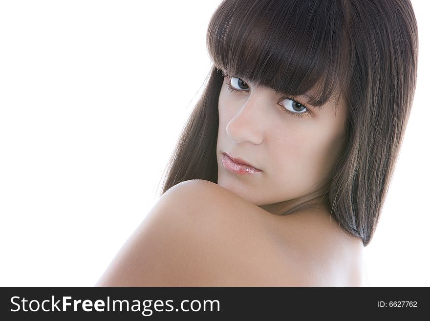 Beautiful woman look over her shoulder over white
