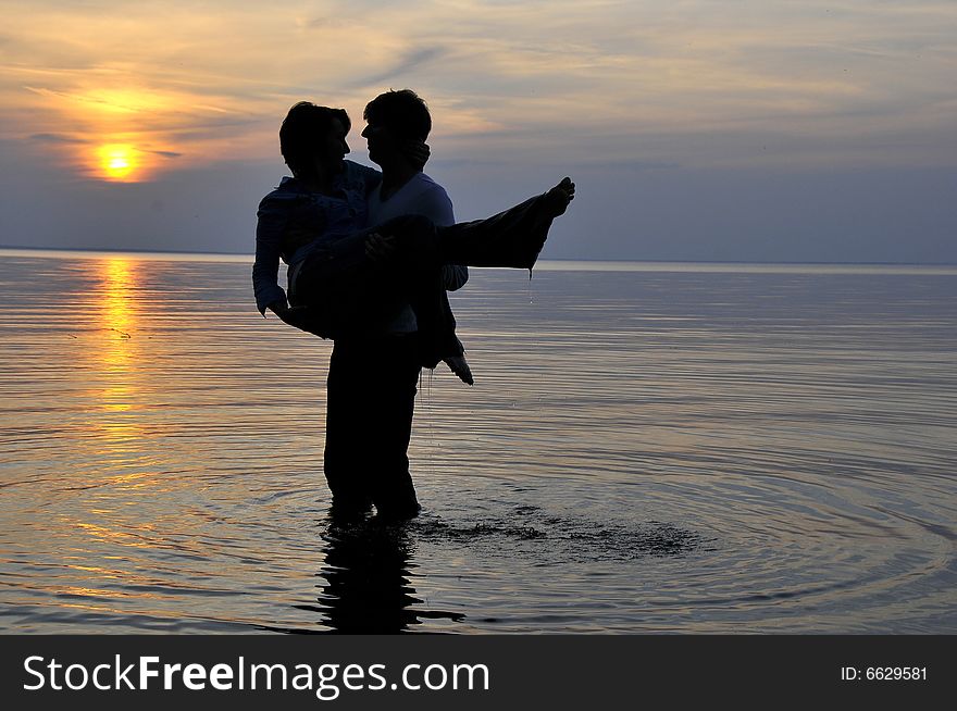 Romantic couple at sunset