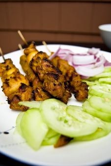 Satay With Cucumber & Onions Stock Image