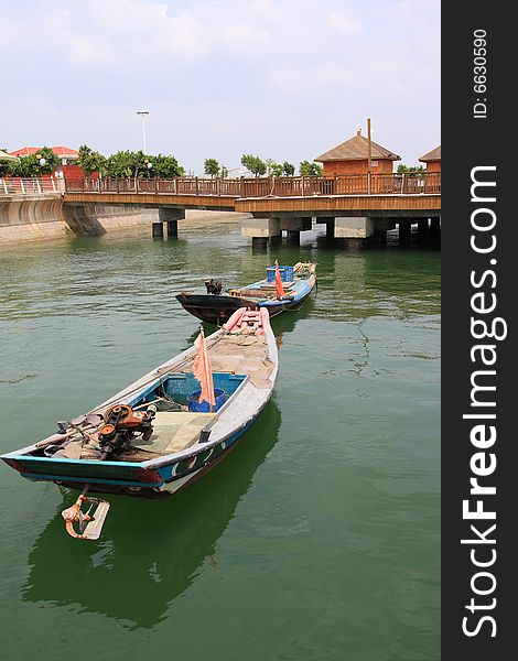 Two little old fishing boat park by beach. Two little old fishing boat park by beach.