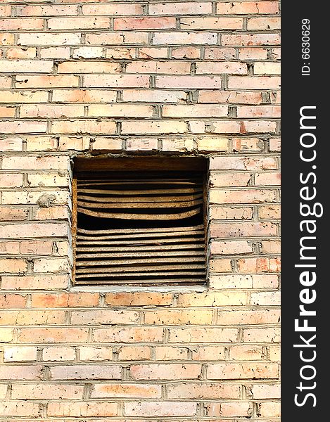 Ventilation Window On Brick Wall.