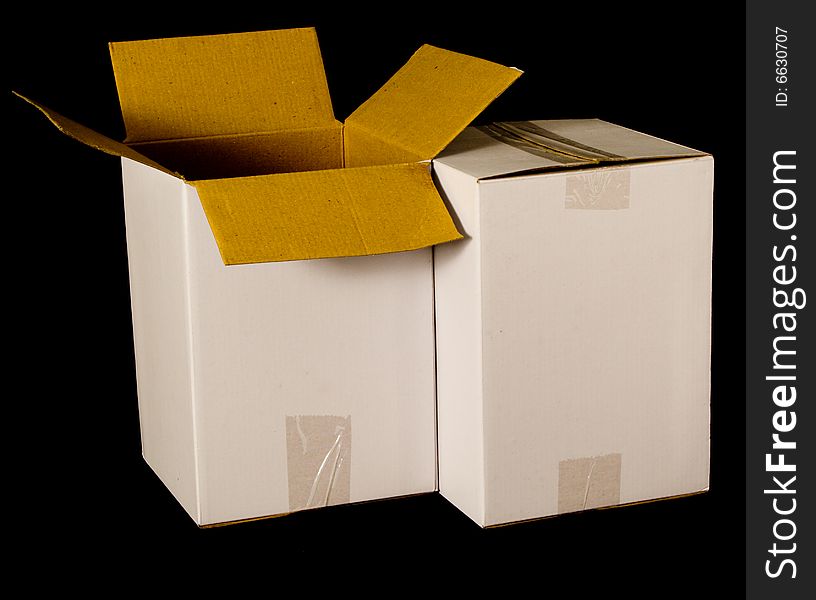 Cardboard boxes isolated on a black background