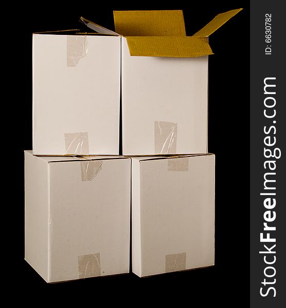 Cardboard boxes isolated on a black background