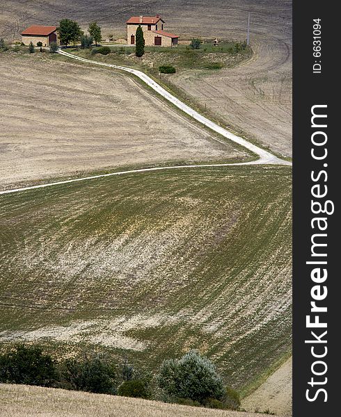 Tuscan landscape Valle d'Orcia, italy, isolated farm surronded by fields. Tuscan landscape Valle d'Orcia, italy, isolated farm surronded by fields