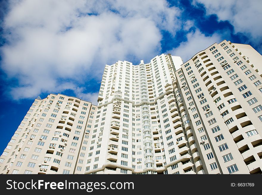 Modern buildings over blue sky background