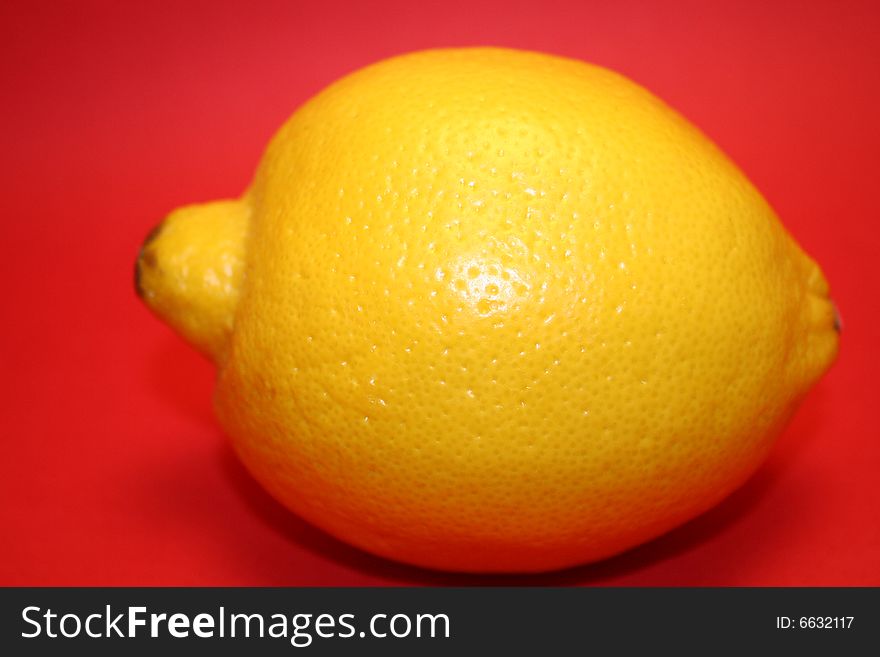 Lemon on a red background. Lemon on a red background