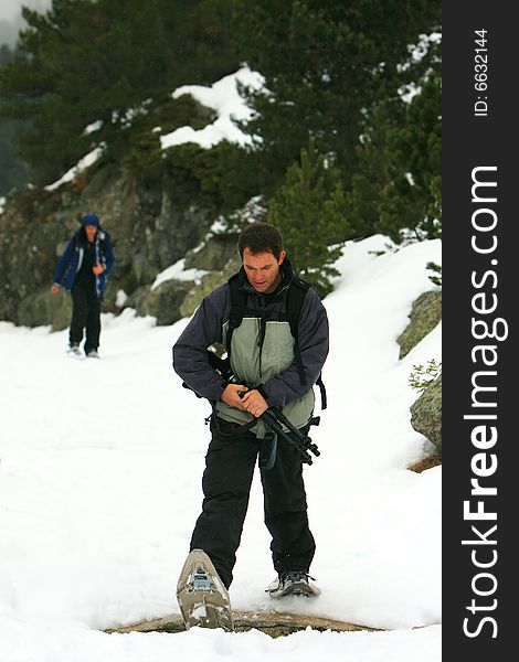 Hikers on a snowy mountain -  Pyrenees, France