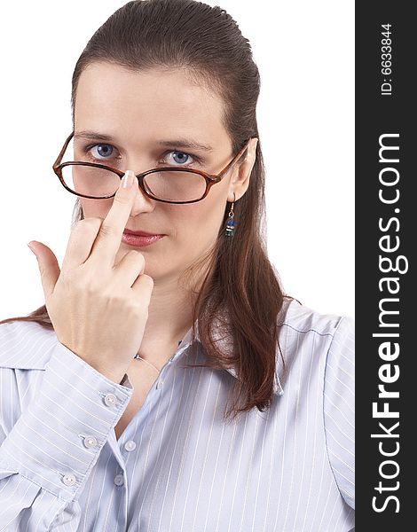 Beautiful brunette businesswoman wearing a blue shirt showing middle finger. Isolated on white background