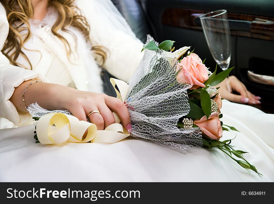 Ring, hands and  flowers of the bride. Ring, hands and  flowers of the bride