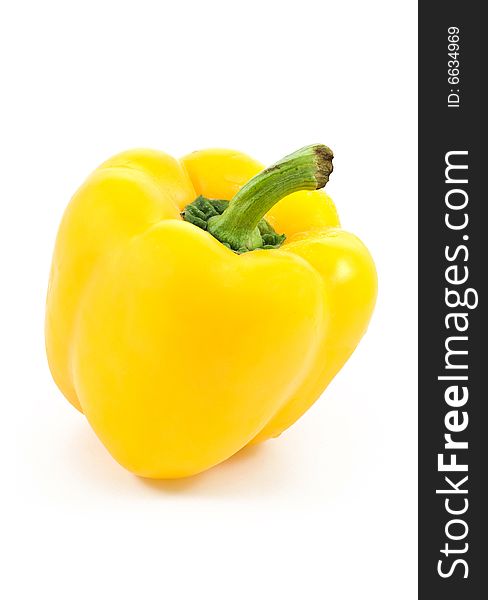 A yellow fresh pepper isolated on white. A yellow fresh pepper isolated on white