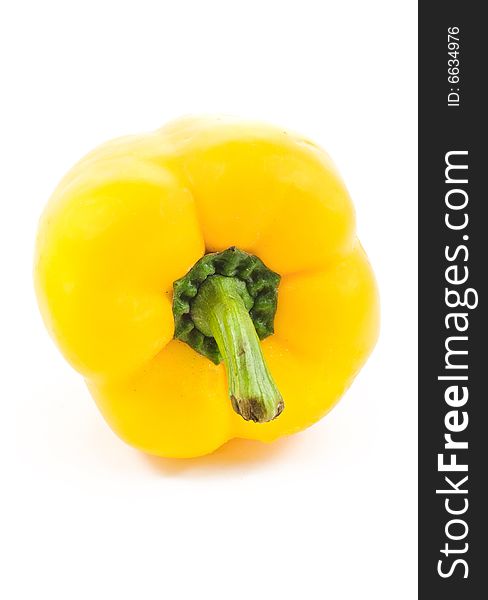 A yellow fresh pepper isolated on white. A yellow fresh pepper isolated on white