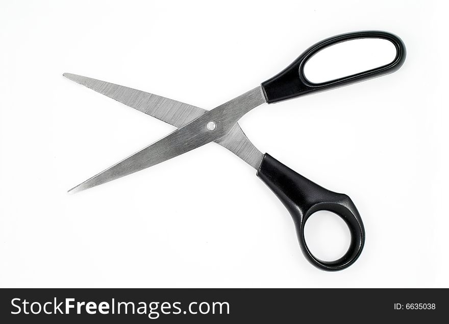 Black scissors isolated on white