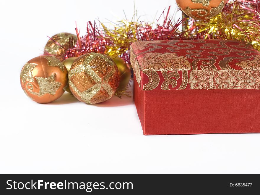 Present box under the Christmas tree isolated on a white background. Present box under the Christmas tree isolated on a white background.