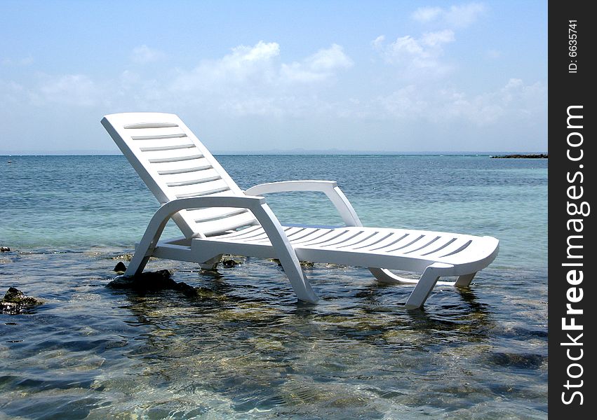 Chair on the beach of exotic sea