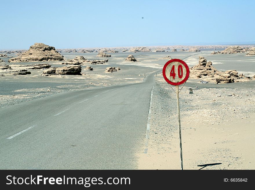 Yadan landforms- The world Geologic Garden on the Desert which is the lmmense in Scale. the most perfect in their shapes and the richest in intension in the world.
Yadan landform and road in the GObi desert ,40 Speed limit signs,dunhuang  china ,