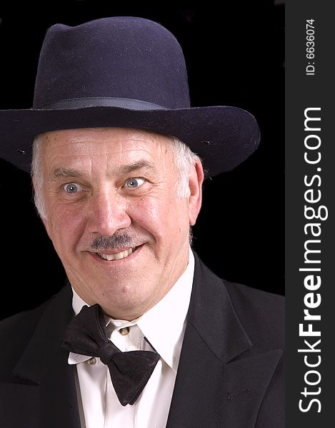 Older man dressed as charlie chaplin or Laurel and Hardy with surprised look for Halloween. Older man dressed as charlie chaplin or Laurel and Hardy with surprised look for Halloween