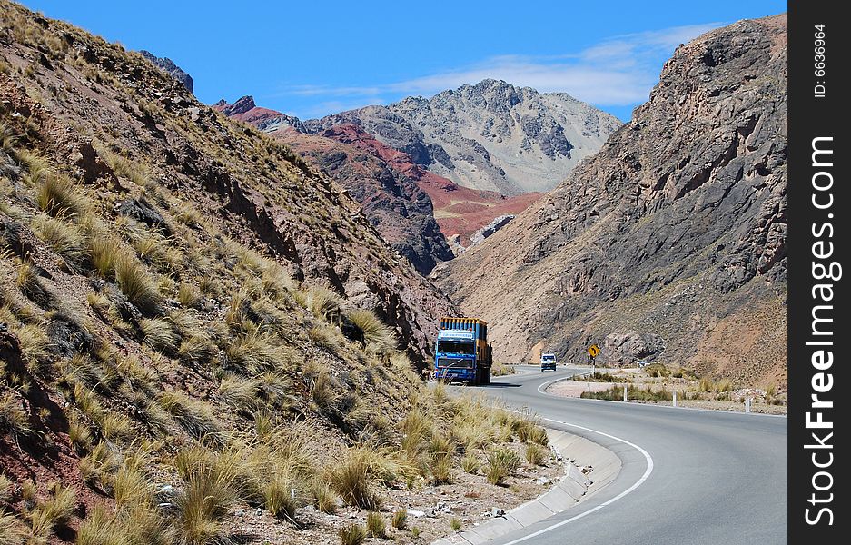 A road in the middle of a valley in the Andes. A road in the middle of a valley in the Andes