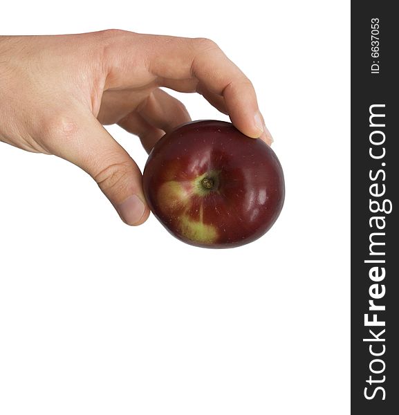 Red apple in a hand on a white background