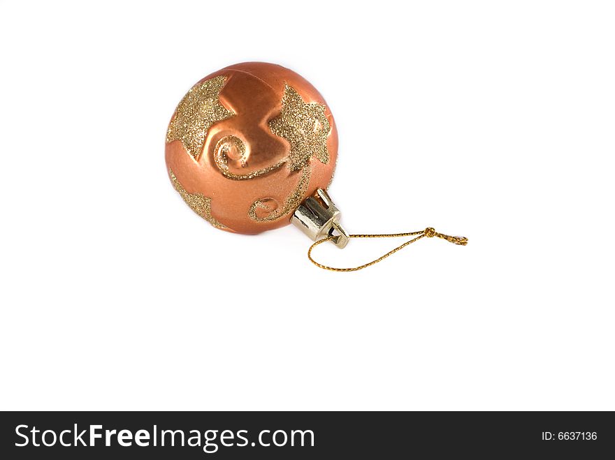 Christmas decoration isolated on a white background. Golden shiny ball.