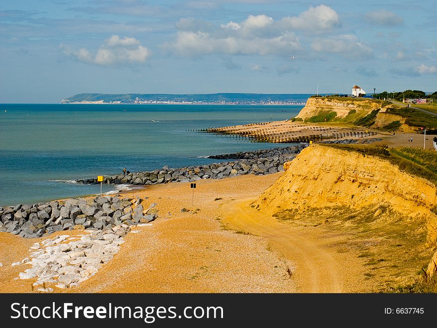 The View from Galley Hill to Beachy head is stunning on a clear day the Sandy cliffs of Bexhill with the Observation post where the late Goon Spike Milligan started his Military escapades in the Second World War is in the Foreground. The View from Galley Hill to Beachy head is stunning on a clear day the Sandy cliffs of Bexhill with the Observation post where the late Goon Spike Milligan started his Military escapades in the Second World War is in the Foreground.