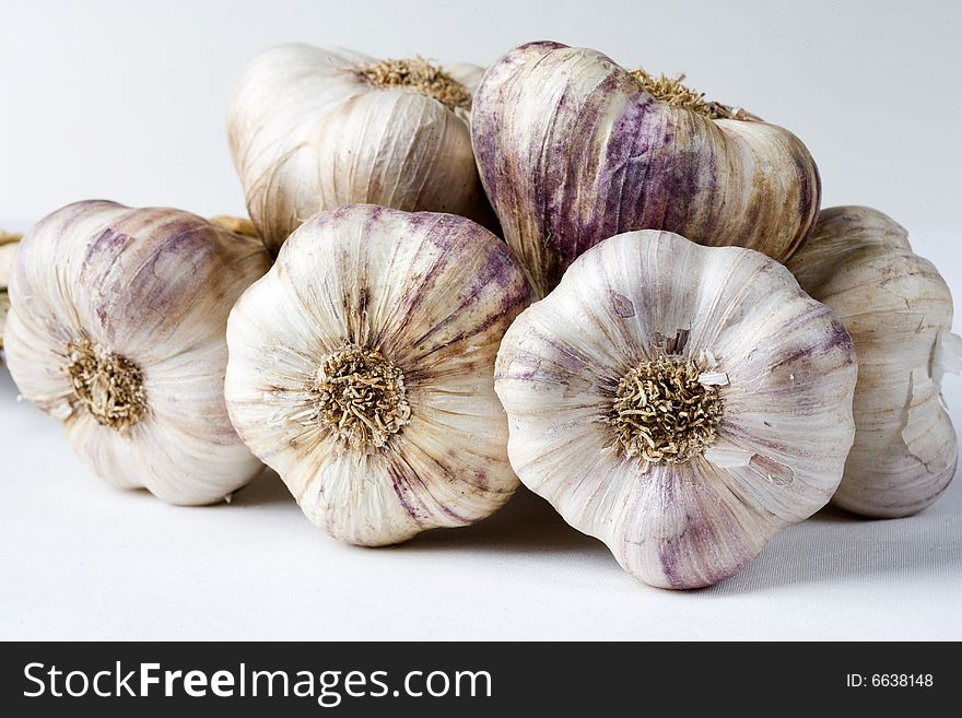 Garlic bulbs on a white background. Garlic bulbs on a white background.