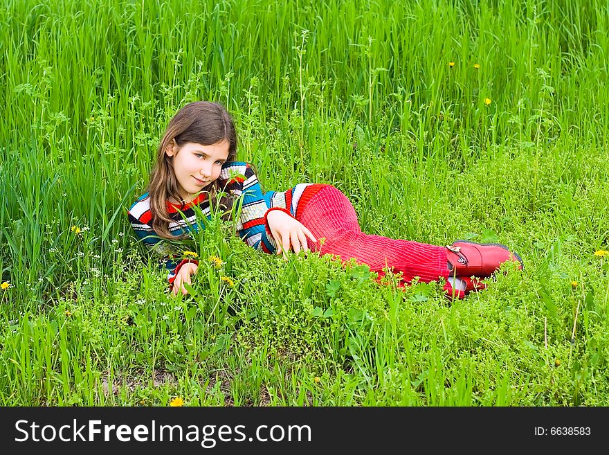 Teen girl in grass for your design