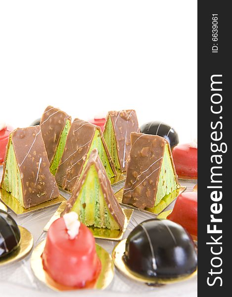 A variety of colorful confectionery sweets on a white background.