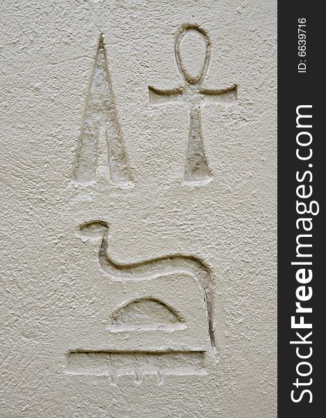 Ancient Egyptian hieroglyphics - replica on stone wall