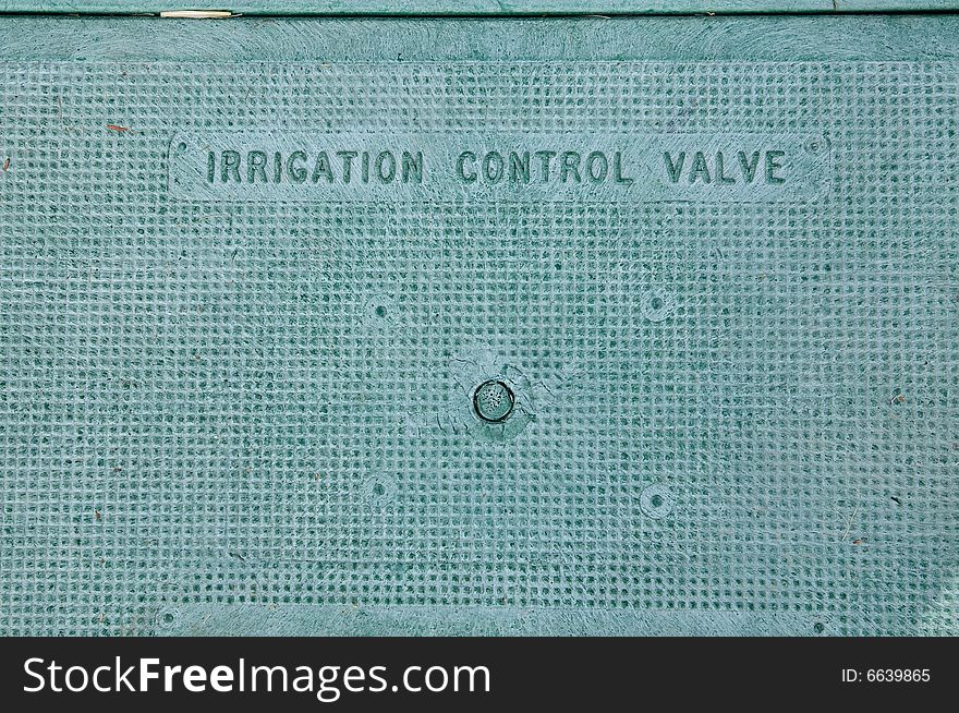 Grunge metal irrigation control valve hatchway